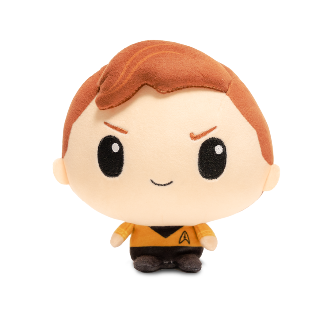 Front view of a Captain Kirk plush with reddish-brown hair, a gold Starfleet uniform, black collar, and Starfleet insignia.