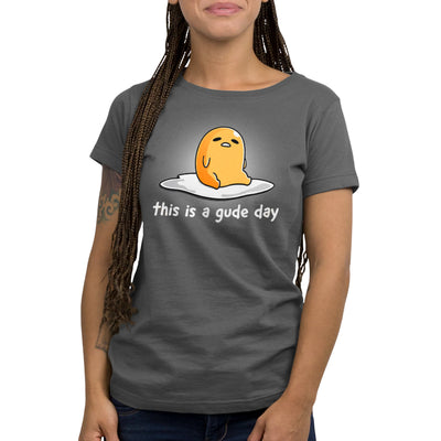 Premium Cotton T-shirt_TeeTurtle charcoal gray This is a Gude Day apparel featuring Gudetama with a tired expression sitting up in the middle of an egg white.