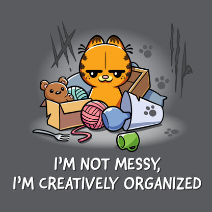 Premium Cotton T-shirt_TeeTurtle charcoal gray I'm Not Messy, I'm Creatively Organized apparel featuring a smug Garfield surrounded by a messy assortment of objects.