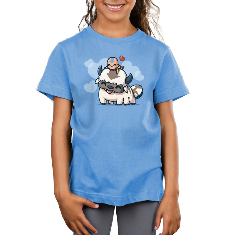 Premium Cotton T-shirt_TeeTurtle light blue BFFs (Aang and Appa) apparel featuring a happy Aang resting on a happy Appa’s head with a red heart above them and light blue hearts in the background.