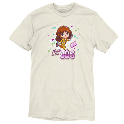 Premium Cotton T-shirt_TeeTurtle natural heather Made in the 80s apparel featuring April O'Neil from Teenage Mutant Ninja Turtles holding a camcorder and microphone with 90's elements in the background, such as a cassette tape, and the caption, "Made in the 80s".