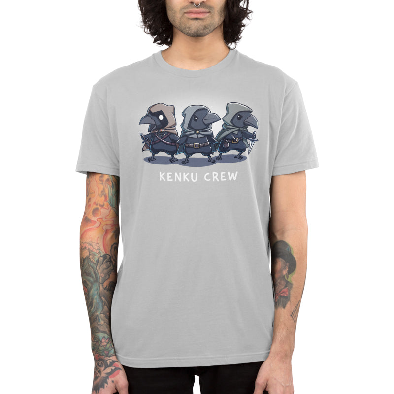 Premium Cotton T-shirt_TeeTurtle silver gray Kenku Crew apparel featuring three hooded Kenku from Dungeons & Dragons with the lefthand Kenku holding a sword, and the righthand Kenku holding a small dagger.