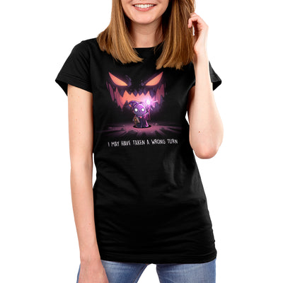 Premium Cotton T-shirt_TeeTurtle black Wrong Turn apparel featuring an anxious cat wizard in a dark cave holding up a staff providing light with silhouette that looks like a sinister monster smiling in the background with the caption, “I May Have Taken a Wrong Turn“.