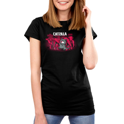 Premium Cotton T-shirt_TeeTurtle Catzilla black t-shirt featuring an illustration of an angry gray cat terrorizing a city knocking down red, blocky buildings with reddish-pink smoke filling the air and "Catzilla" written above the graphic. The text beneath the word CATZILLA resembles Japanese characters or simplified Chinese characters.