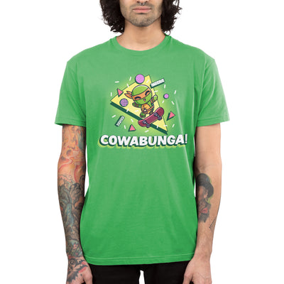 Premium Cotton T-shirt_TeeTurtle apple green Cowabunga! apparel featuring Michelangelo from Teenage Mutant Ninja Turtles on a skateboard with retro 90’s graphics in the background.