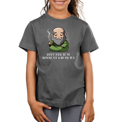 Premium Cotton T-shirt_TeeTurtle charcoal gray Don't Talk To Me Before I've Had My Tea apparel featuring Iroh sitting down with a calm expression and holding a steaming mug of tea.