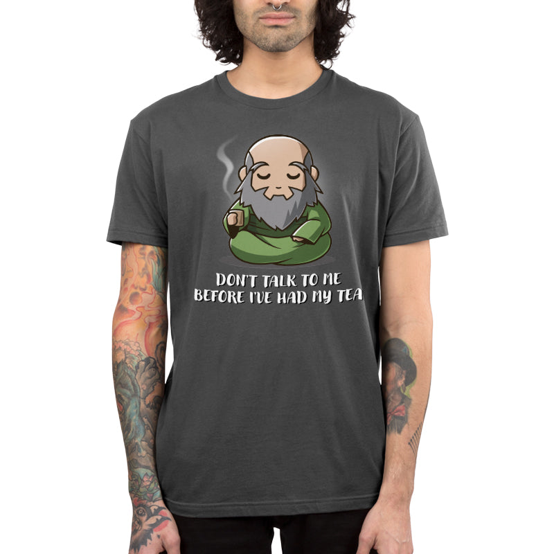 Premium Cotton T-shirt_TeeTurtle charcoal gray Don't Talk To Me Before I've Had My Tea apparel featuring Iroh sitting down with a calm expression and holding a steaming mug of tea.