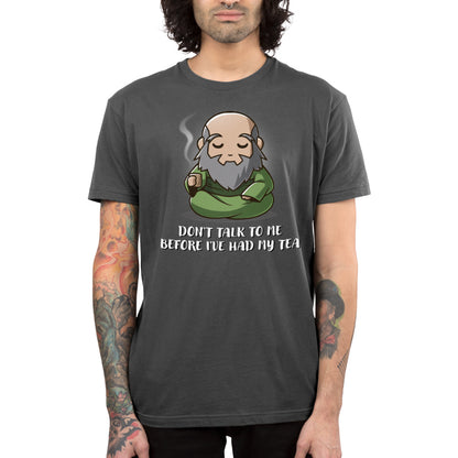 Premium Cotton T-shirt_TeeTurtle charcoal gray Don't Talk To Me Before I've Had My Tea apparel featuring Iroh sitting down with a calm expression and holding a steaming mug of tea.