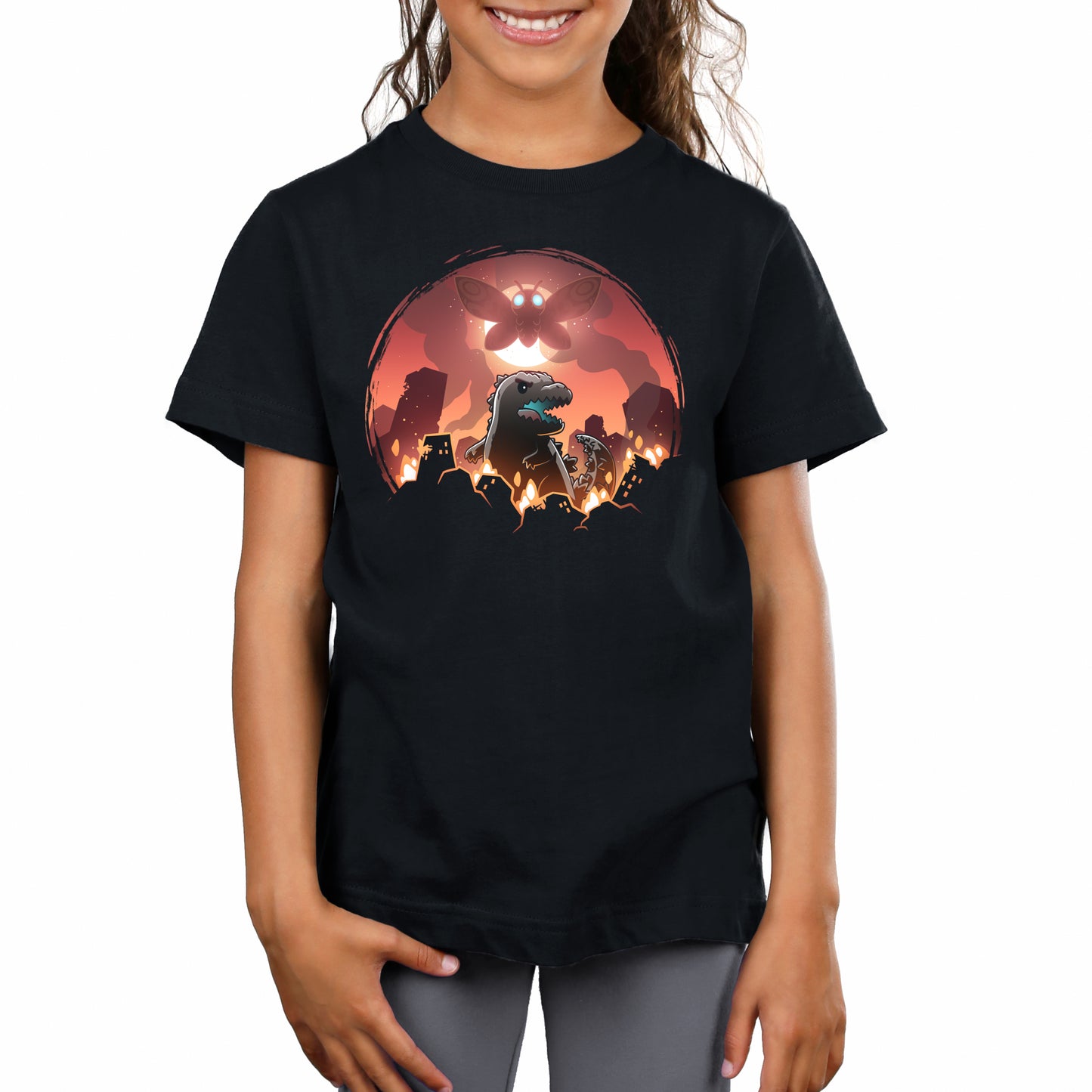 Premium Cotton T-shirt_TeeTurtle black Godzilla and Mothra Rampage apparel featuring Godzilla rampaging around a burning city with Mothra floating in the sky in front of a full moon.