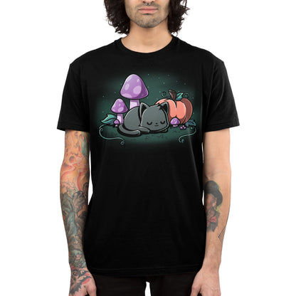 Premium Cotton T-shirt_TeeTurtle black Harvest Haze apparel featuring a black cat sleeping among a pumpkin and purple mushrooms.