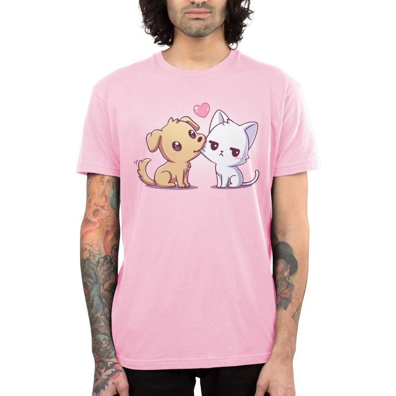 Premium Cotton T-shirt_TeeTurtle light pink I Woof You apparel featuring a dog tugging on a grumpy cat's cheek with its mouth.