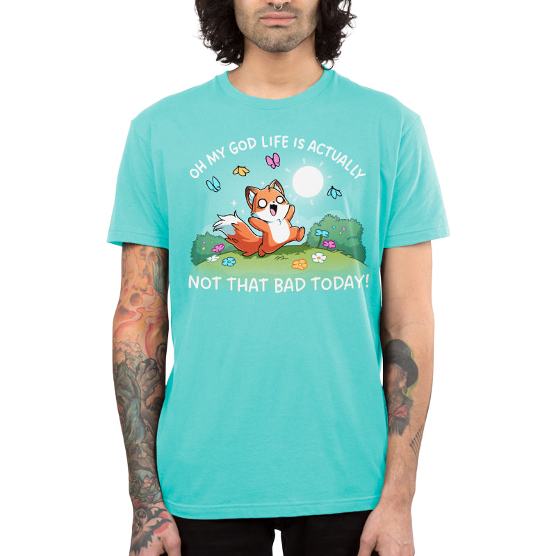 Premium Cotton T-shirt_TeeTurtle Caribbean blue Life Is Not That Bad Today apparel featuring an anxious fox with bags under its wide eyes running in a meadow with colorful flowers and butterflies, with the caption, “Oh My God Life is Actually, Not That Bad Today!“.