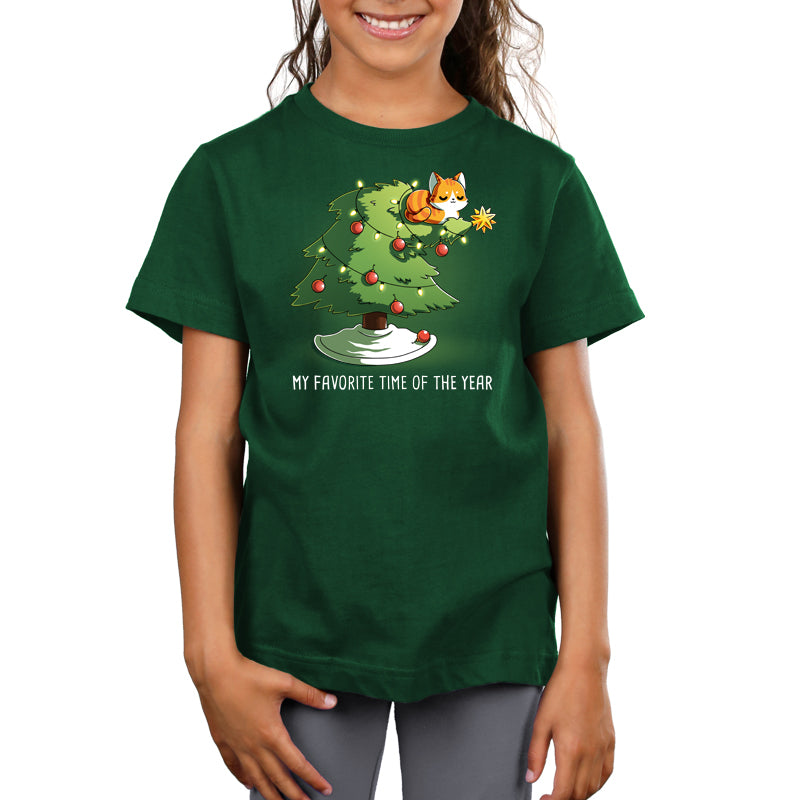 Premium Cotton T-shirt_TeeTurtle forest green My Favorite Time Of Year apparel featuring an orange tabby sitting on top of a Christmas tree that’s bending underneath its weight, with the caption, “My Favorite Time Of The Year“.