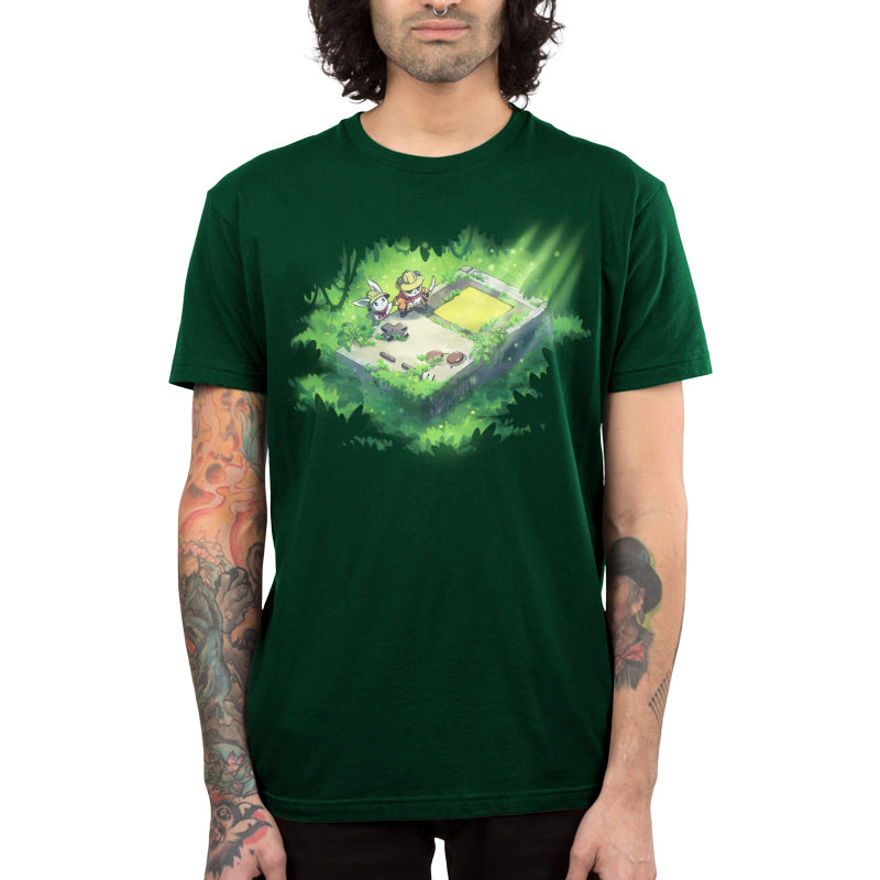 Premium Cotton T-shirt_TeeTurtle forest green Relics of the Past apparel featuring a panda and a bunny wearing explorer outfits climbing over a gigantic handheld video gaming device that’s overgrown with plants in a jungle.