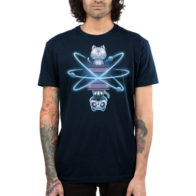 Premium Cotton T-shirt_TeeTurtle navy blue Schrödinger’s Cat apparel featuring a cat with glowing eyes emerging from a box, and a skeleton cat as its mirror image emerging from another box, with both cats surrounded by atoms.