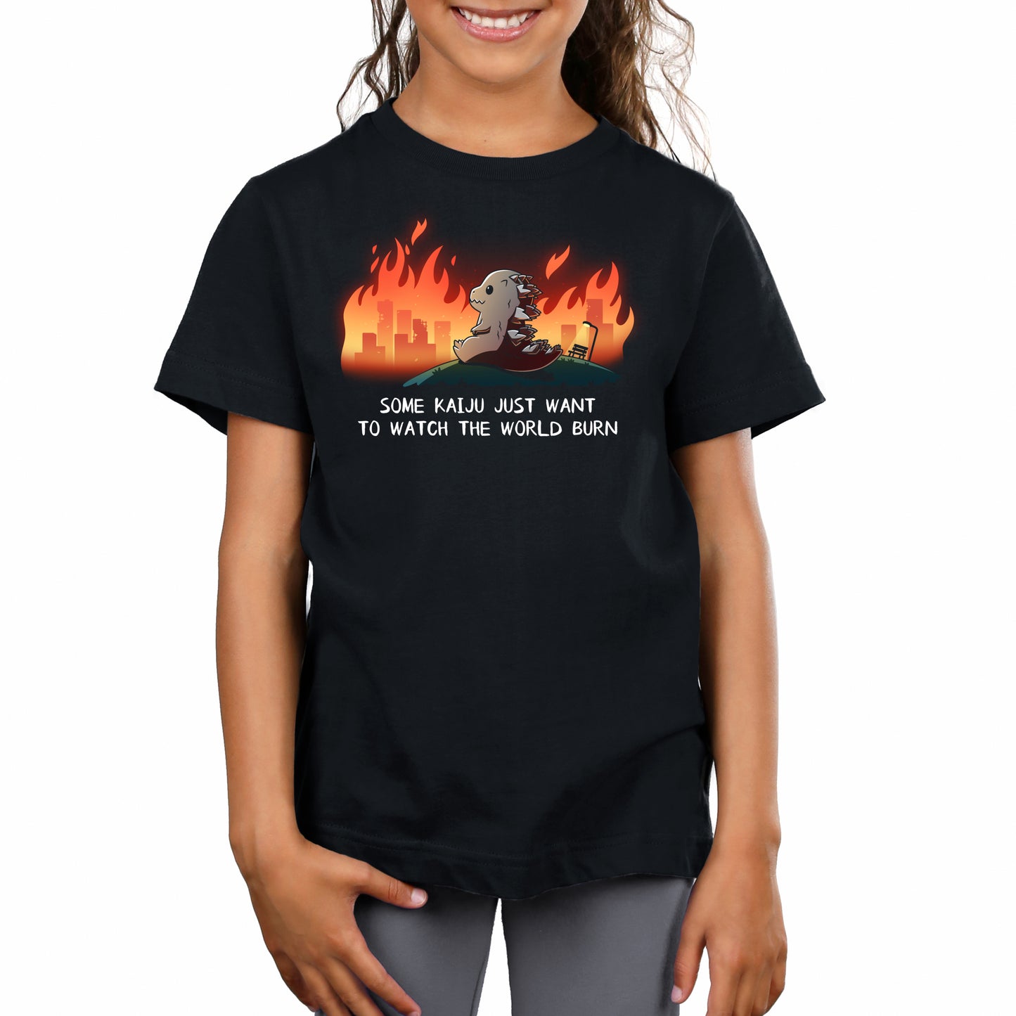 Premium Cotton T-shirt_TeeTurtle black Some Kaiju Just Want to Watch the World Burn apparel featuring a happy Godzilla sitting on a hill watching a burning city in the distance, and the caption, “Some Kaiju Just Want to Watch the World Burn“.