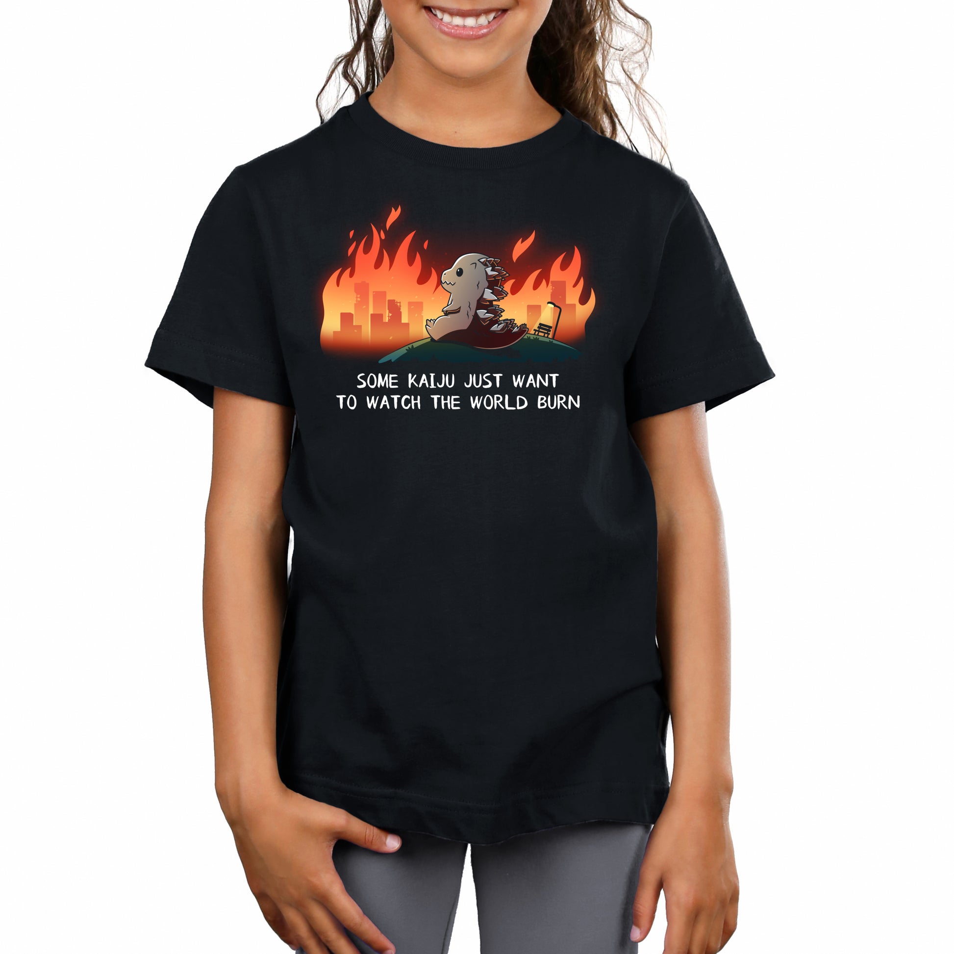 Premium Cotton T-shirt_TeeTurtle black Some Kaiju Just Want to Watch the World Burn apparel featuring a happy Godzilla sitting on a hill watching a burning city in the distance, and the caption, “Some Kaiju Just Want to Watch the World Burn“.