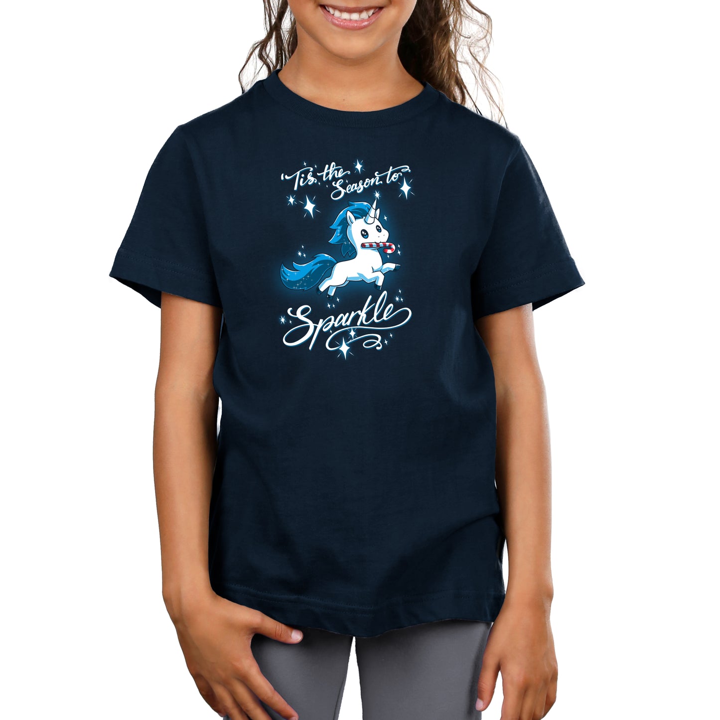 Premium Cotton T-shirt_TeeTurtle navy blue 'Tis The Season To Sparkle apparel featuring a leaping unicorn with a candy cane in its mouth surrounded by sparkles, with the caption, “'Tis The Season To Sparkle“.