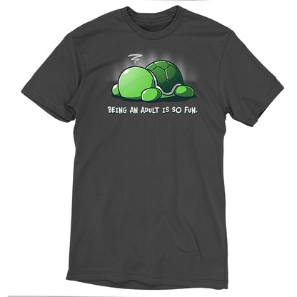 Premium Cotton T-shirt - A dark gray apparel featuring a graphic of a tired turtle with text that reads, "Being an adult is so fun." The Being An Adult Is So Fun charcoal gray apparelby monsterdigital is crafted from super soft ringspun cotton for ultimate comfort, making it the perfect blend of style and adult humor.