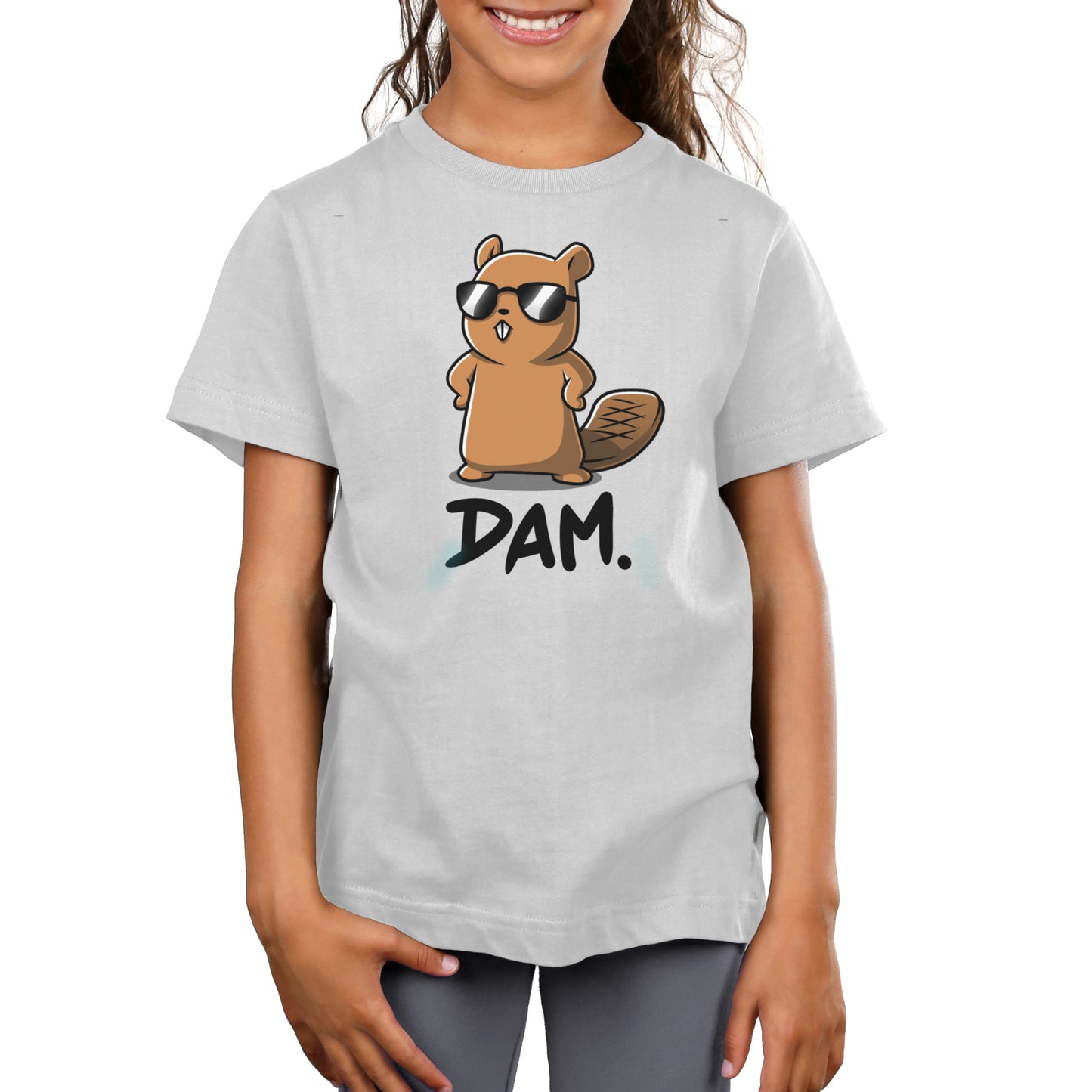 Premium Cotton T-shirt - A girl wearing a monsterdigital apparel featuring a cartoon beaver in sunglasses and the word "DAM." is smiling, enjoying the super soft cotton fabric.