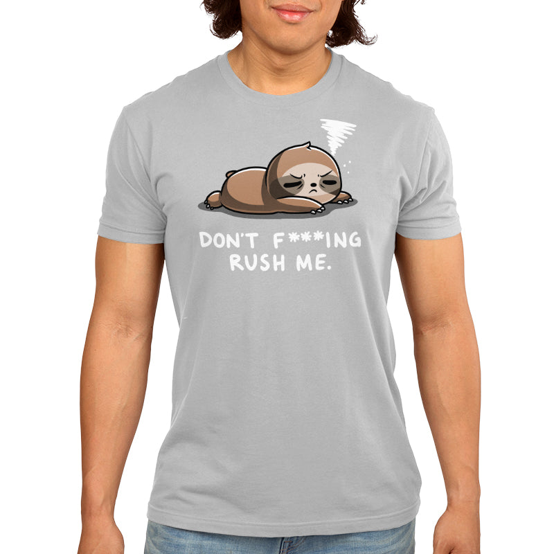 Premium Cotton T-shirt - A person wearing a light gray apparel made of super soft ringspun cotton with a cartoon of a tired sloth lying down and the text "Don't F***ing Rush Me" from monsterdigital.