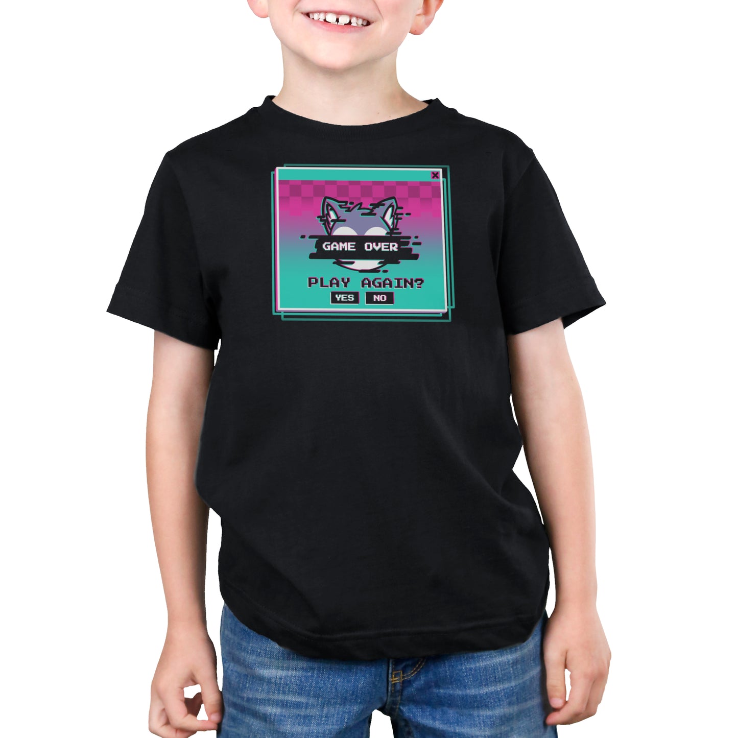 A child wearing a black Game Over, Play Again? t-shirt from monsterdigital made from super soft ringspun cotton with a colorful graphic of a cat and the text "Game Over" and "Play Again? Yes No." The unisex tee complements their slight smile as they stand with hands by their sides.
