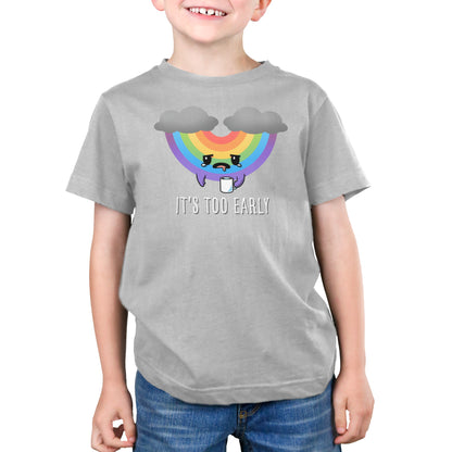 Premium Cotton T-shirt - A child is standing and smiling, wearing a super soft ringspun cotton apparel in grey with a colorful design of a sad rainbow and two clouds. Below the image, the text reads "IT'S TOO EARLY", making this monsterdigital "It's Too Early" apparel both comfy and cute.