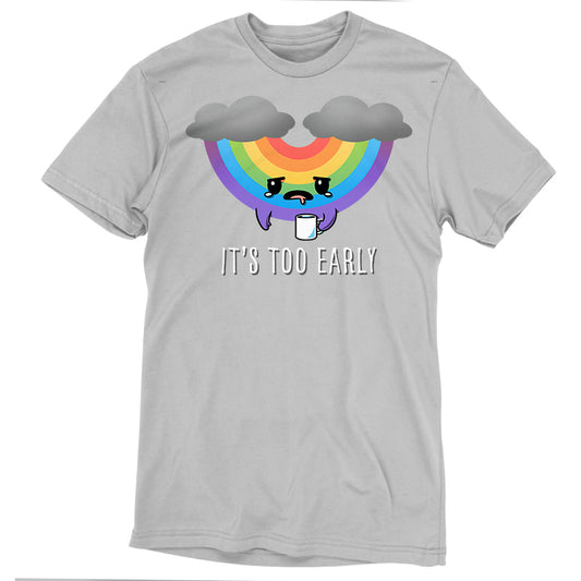 A super soft, silver T-shirt featuring a frowning rainbow beneath gray clouds, holding a coffee cup with the text 