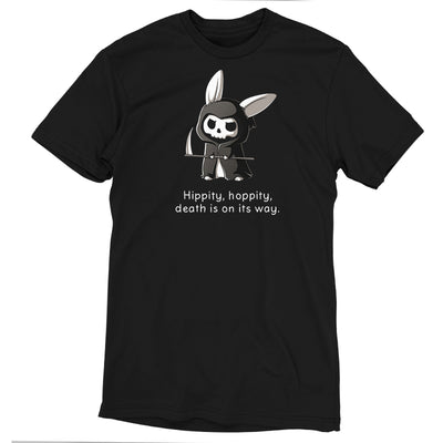 Premium Cotton T-shirt_Teeturtle Grim Bunny (Glow) Black Featuring a hooded, Grim Reaper-looking bunny with a skull face and a scythe with 'Hippity, hoppity, death is on its way.' written beneath.