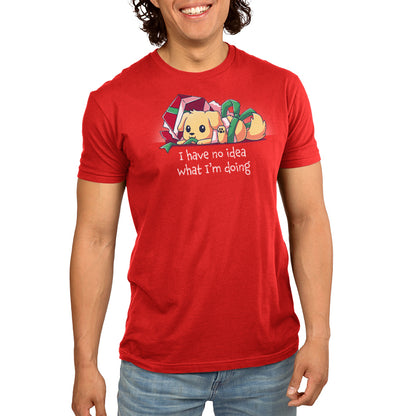 Premium Cotton T-shirt_TeeTurtle red Presently Confused apparel featuring a dog tangled up in wrapping paper and ribbon, with the caption, “I Have No Idea What I’m Doing”.