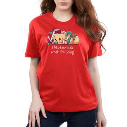 Premium Cotton T-shirt_TeeTurtle red Presently Confused apparel featuring a dog tangled up in wrapping paper and ribbon, with the caption, “I Have No Idea What I’m Doing”. 