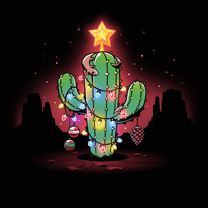 Premium Cotton T-shirt_TeeTurtle A Desert Christmas Black t-shirt featuring an artistic cactus with lights, ornaments, a star, and a gecko on top in front of a grand canyon inspired silhouetted background.