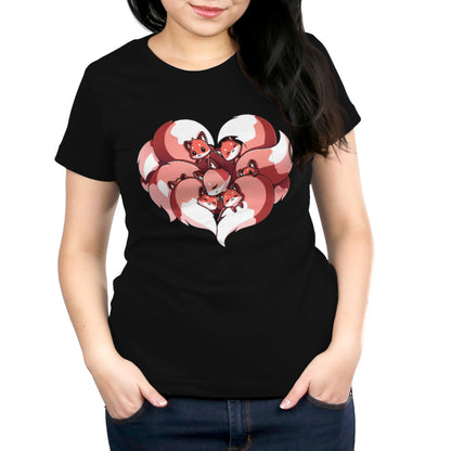 Person wearing a black T-shirt made of 100% super soft ringspun cotton, featuring a heart-shaped design of nine foxes cuddling together. The T-shirt is called "A Mother's Love" by monsterdigital.