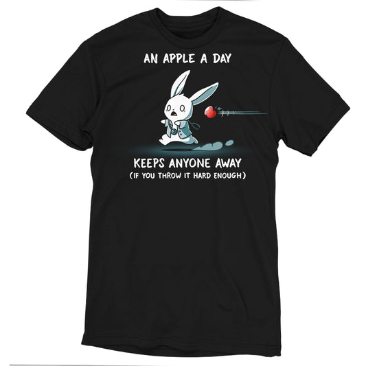 Black unisex tee featuring a white cartoon rabbit throwing an apple, with the text “An apple a day keeps anyone away (if you throw it hard enough).