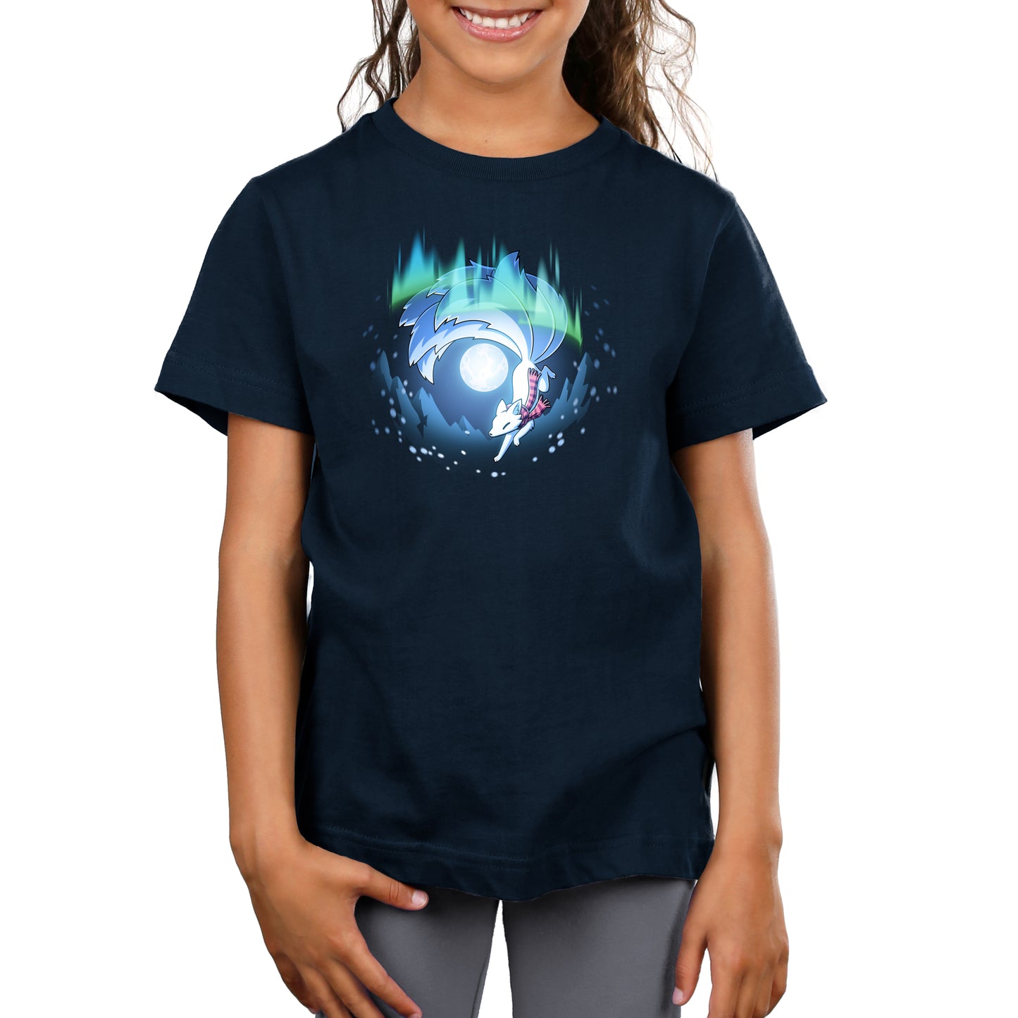 Premium Cotton T-shirt_TeeTurtle navy blue Aurora Kitsune apparel featuring a white kitsune running through the aurora borealis with snowy mountains and a full moon in the background.