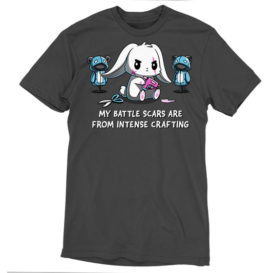 Battle Scars by monsterdigital: Charcoal gray tee featuring a cartoon rabbit with a glue gun, flanked by two plush bears. Text reads: 
