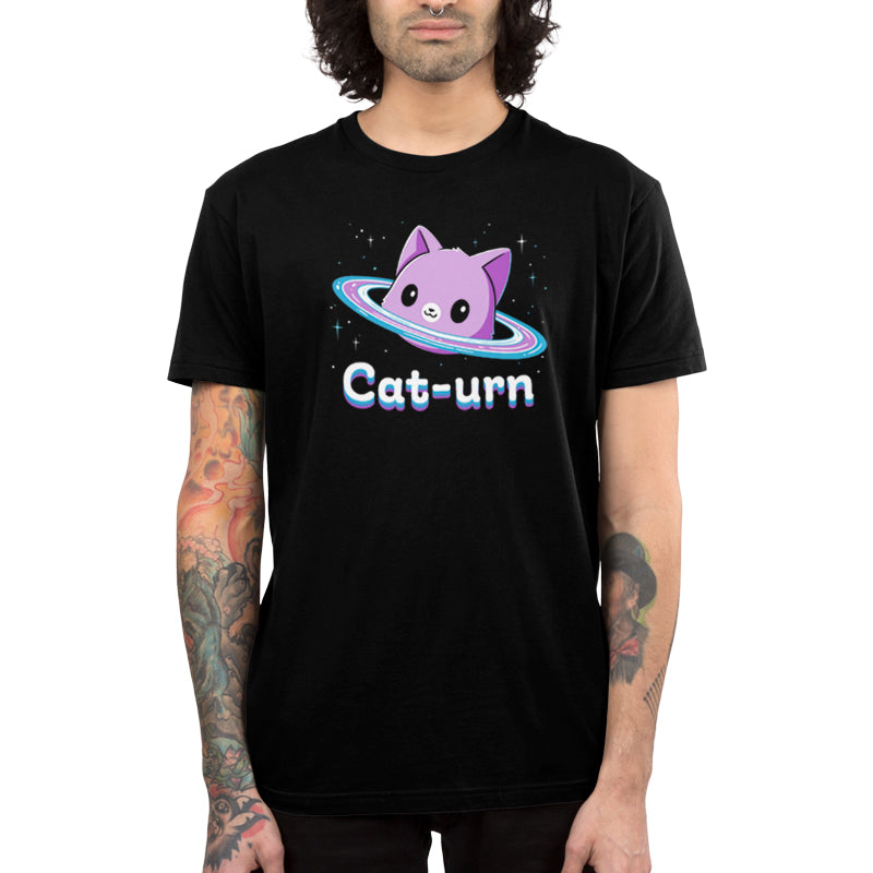 Premium Cotton T-shirt_Teeturtle Cat-urn black t-shirt featuring a cute cat head floating in space surrounded by stars and rings like Saturn and the word 'Cat-urn' written below it.