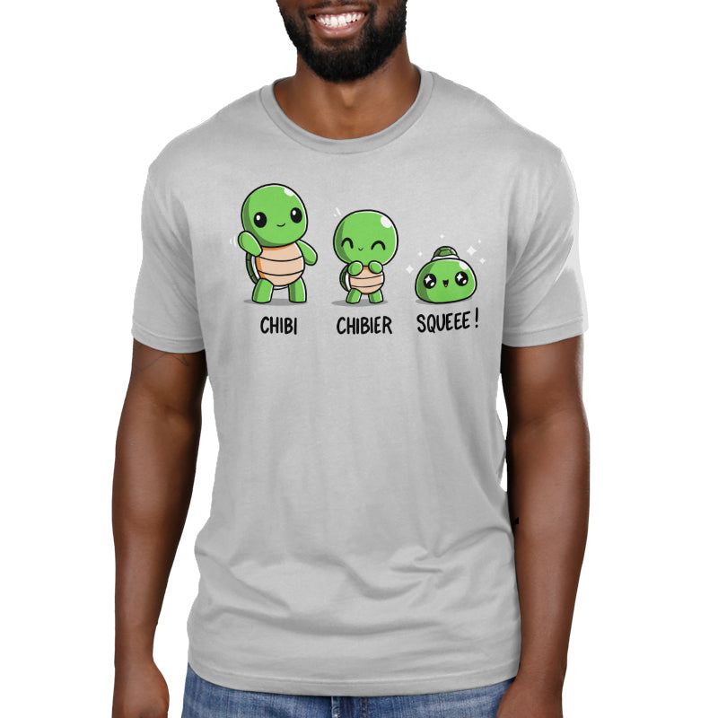 Premium Cotton T-shirt - A person wearing a super soft ringspun cotton monsterdigital apparel featuring three cartoon turtles labeled "Chibi, Chibier, Squeee!".