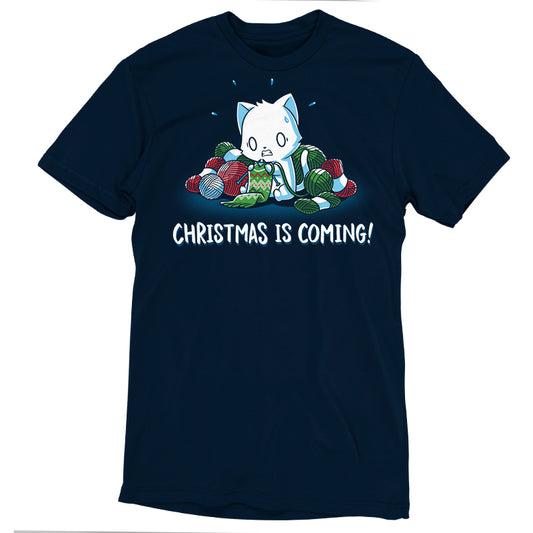 Premium Cotton T-shirt_TeeTurtle Christmas is Coming! navy blue t-shirt featuring an anxious cat that is crafting gifts for Christmas