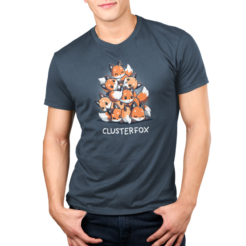 A person wearing a super soft ringspun cotton monsterdigital Clusterfox T-shirt with an illustration of a group of foxes and the text "CLUSTERFOX.