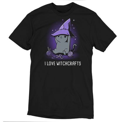 Premium Cotton T-shirt_TeeTurtle Crafty Kitty black t-shirt featuring a cheerful gray cat wearing a witches hat and crafting.