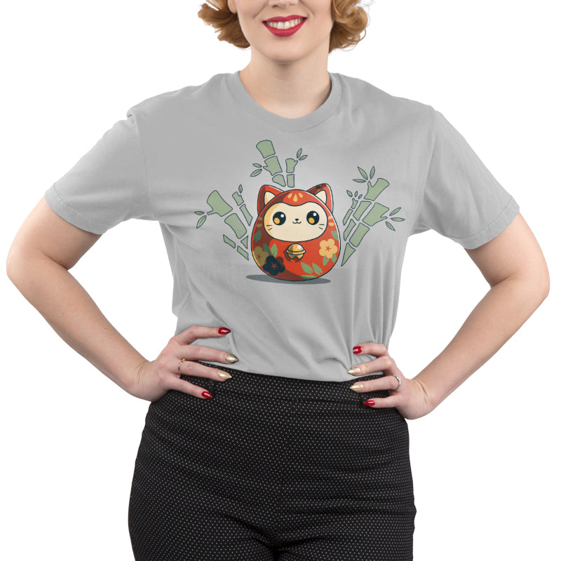 Premium Cotton T-shirt_TeeTurtle Daruma Kitty silver gray t-shirt featuring a little daruma cat wrapped in orange with yellow and blue flowers and green leaves. The daruma is surrounded by bamboo.