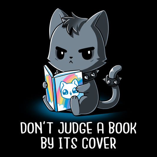 Premium Cotton T-shirt_TeeTurtle Don't Judge a Book By It's Cover black t-shirt featuring seemingly grumpy, goth-looking cat wearing a spiked collar and spiked ring on its tail reading a bright, happy-looking rainbow-covered book above the text 'Don't Judge A Book By Its Cover.'