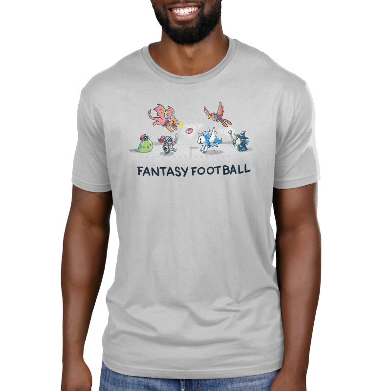 A person wearing a super soft ringspun unisex cotton tee with "Fantasy Football" text and illustrations of fantasy creatures playing football from monsterdigital.