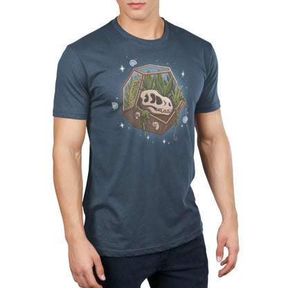 Premium Cotton T-shirt_TeeTurtle Flora Fossils denim t-shirt featuring an illustration of a skull in a hexagonal glass terrarium with various plants growing inside, surrounded by small stars and swirls.