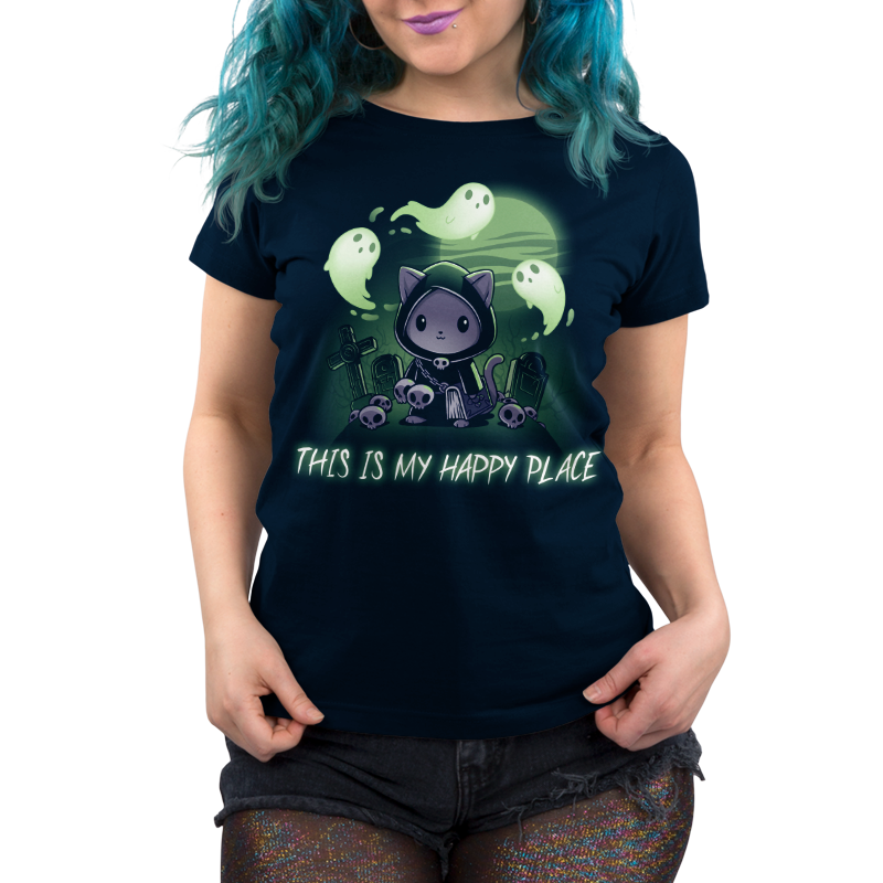 Premium Cotton T-shirt_TeeTurtle Graveyards are My Happy Place navy blue t-shirt featuring an illustration of a cat wearing a black, hooded cape and holding a book standing in a graveyard surrounded by skulls and tombs with ghosts floating above. "THIS IS MY HAPPY PLACE" is written below the illustration.