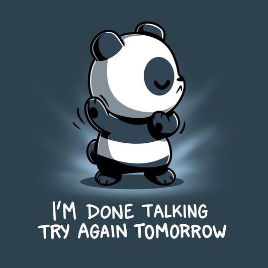 Illustration of a panda with its eyes closed and arms crossed, wearing a denim blue t-shirt, accompanied by the text, 