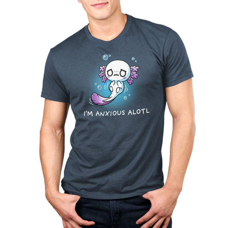 A person wearing a denim-colored t-shirt with a cartoon axolotl and the text "I'm Anxious Alotl." The super soft ringspun cotton makes it extra comfy. The t-shirt is called "I'm Anxious Alotl" by monsterdigital.