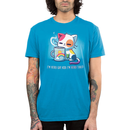 Premium Cotton T-shirt - Person wearing an I’m Very Gay and Very Tired with a graphic of a tired cartoon cat holding a mug, and text that reads, "I'M VERY GAY AND I'M VERY TIRED." The person has long hair and tattoos on their arms. The super soft ringspun cotton apparelfrom monsterdigital looks incredibly comfortable.