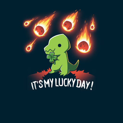 Premium Cotton T-shirt_TeeTurtle It's My Lucky Day navy blue t-shirt featuring a dinosaur holding a four-leaf clover while meteors fall from the sky. The text below reads, "It's my lucky day!"